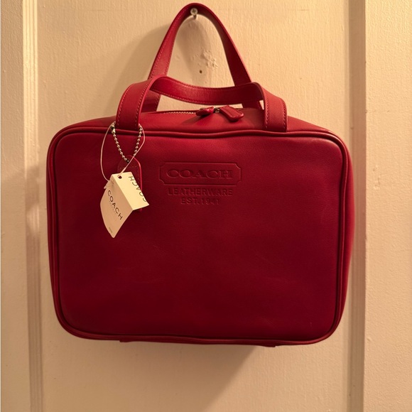 Coach Handbags - Red Leather coach toiletry bag